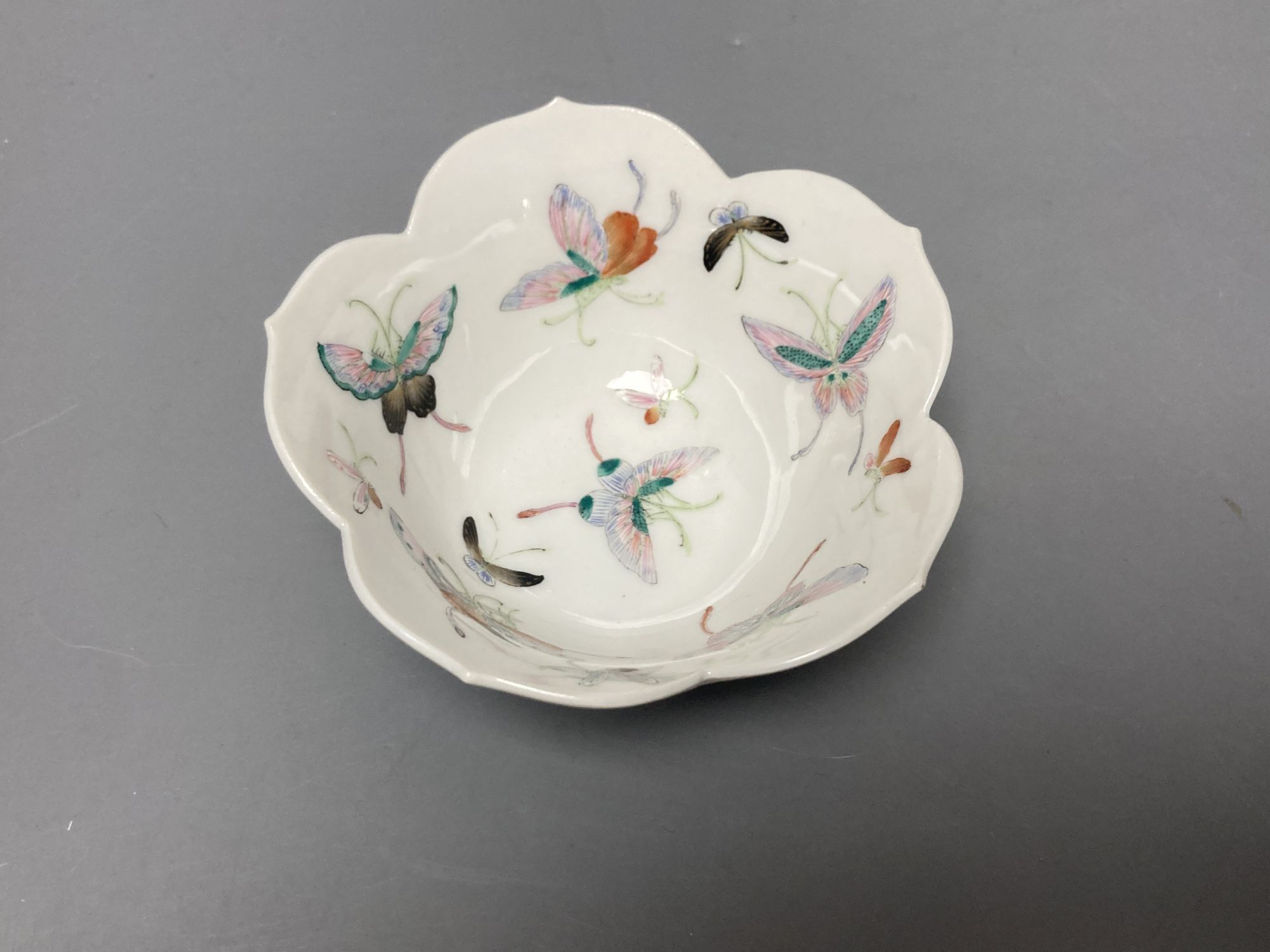 A Chinese famille rose 'butterfly' bowl, diameter 12cm